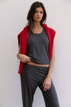 Model wearing a charcoal tank top and matching charcoal pants